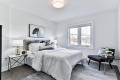 Clean and comfortable bedroom in a residential treatment setting promoting rest, healing, recovery, and overall wellness