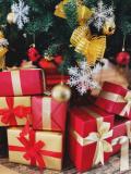 Wrapped Christmas gifts beneath a decorated holiday tree, representing family traditions, celebration, and seasonal gatherings