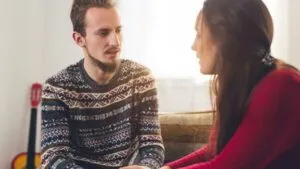 Family members having a supportive conversation about addiction recovery