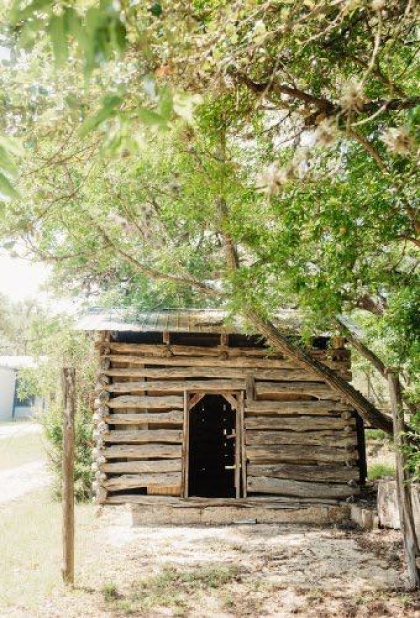 Historic cabin on the Windmill Wellness Ranch property