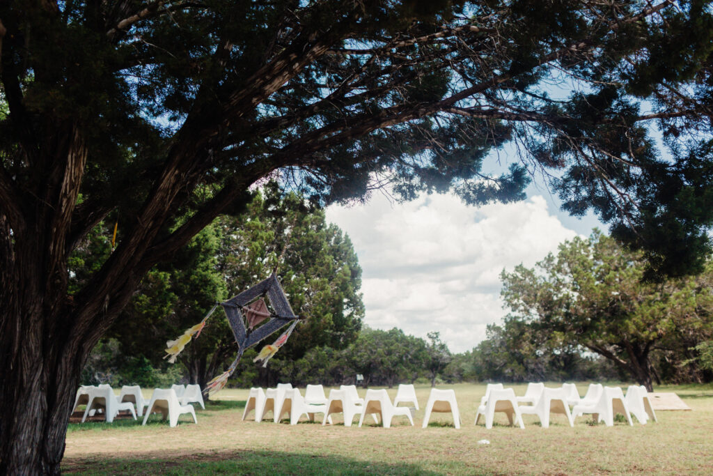 Outdoor recovery group seating area arranged in a circle on a grassy field