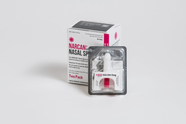 Narcan nasal spray two pack box held in hand, representing overdose prevention, emergency response, and harm reduction in addiction treatment