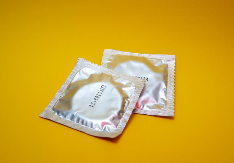 Condom packages representing sexual health education, safer choices, wellness awareness, and healthy lifestyle support