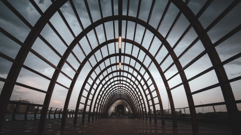 Architectural tunnel walkway symbolizing the journey through recovery, healing, and personal transformation