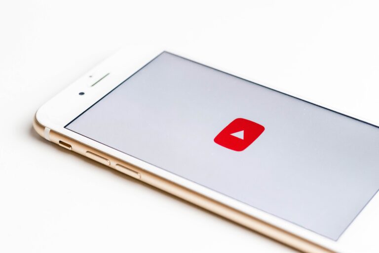 Smartphone displaying a video streaming app, representing online video content, digital media consumption, and screen time habits